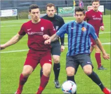  ?? Picture: Ian Ralphs ?? Canterbury City (burgundy) held leaders Sevenoaks to a 2-2 draw on Saturday