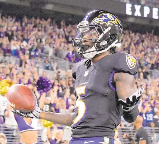  ?? KARL MERTON FERRON/BALTIMORE SUN ?? Ravens wide receiver Marquise Brown reacts after his third-quarter touchdown catch Monday night.