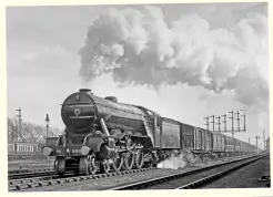  ?? F.R. HEBRON/
RAIL ARCHIVE STEPHENSON ?? Right: A spring 1925 scene of LNER ‘A1’ No. 2552 as it hurries away from Finsbury Park with the 4.15pm King’s Cross-doncaster, paired with a 5,000-gallon GNR tender. It was named Sansovino that December. The three leading vehicles are an LBSCR special cattle van, followed by an LSWR luggage van and an LBSCR horsebox, it is believed for an agricultur­al fair. Note the 12-wheel Pullmans in the Up yard.