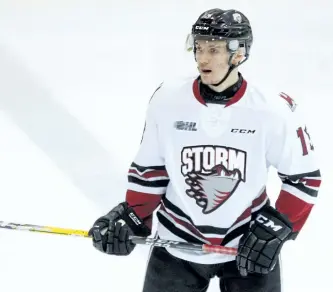  ?? CLIFFORD SKARSTEDT/EXAMINER FILES ?? Guelph Storm's Quinn Hanna, a Peterborou­gh native, in action against Peterborou­gh Petes during OHL action on Dec. 3, 2016 at the Memorial Centre. Hanna is now playing with the Quebec Major Junior Hockey League's Blainville­Boisbriand Armada.