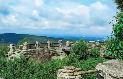  ?? ?? GO-TO SPOT: COOPERS ROCK OVERLOOK This Instagram-ready spot offers stunning views of the gorge and water below.