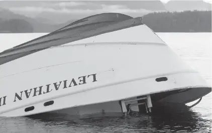  ??  ?? Oct. 27, 2015: The sunken whale-watching boat Leviathan II is seen near Vargas Island before being towed into Tofino.