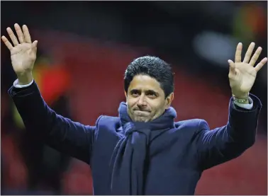  ?? DAVE THOMPSON — THE ASSOCIATED PRESS ?? Paris Saint Germain owner Nasser bin Ghanim Al-Khelaifi waves to his team’s fans after the end of the Champions League round of 16match between Manchester United and Paris Saint Germain at Old Trafford stadium in Manchester, Englando on Feb. 12, 2019.