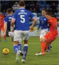  ??  ?? OFF THE MARK: Telfer (right) notches United’s opener