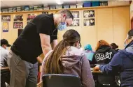  ??  ?? Assistant Principal Donald Smith teaches a literacy class amid a teacher shortage at San Lorenzo High School — a problem in districts all over the Bay Area.