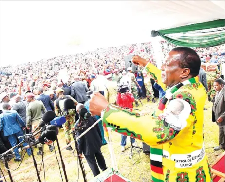  ??  ?? President Mnangagwa joins thousands of ZANU-PF supporters in song and dance at a rally in Mvuma in February