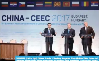  ??  ?? BUDAPEST: (Left to right) Chinese Premier Li Keqiang, Hungarian Prime Minister Viktor Orban and Bulgarian Premier Boyko Borisov speak during an economic forum attended by 16 central and eastern European leaders yesterday in Budapest. —AFP