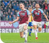  ??  ?? Burnley’s Ashley Barnes runs to his fans