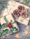  ?? 123RF STOCK PHOTO ?? Brown paper packages at Christmas, with a touch of classic holiday trim.