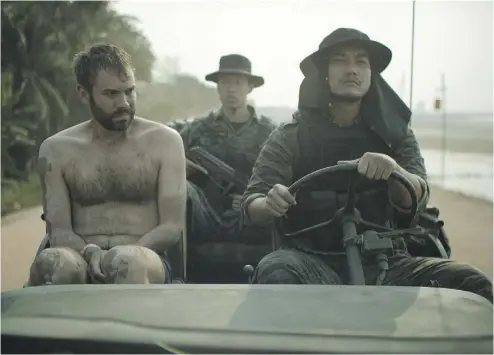  ?? ELEVATION PICTURES. ?? Rossif Sutherland plays an American volunteer doctor on the run from the Laotian police, never a good thing.
