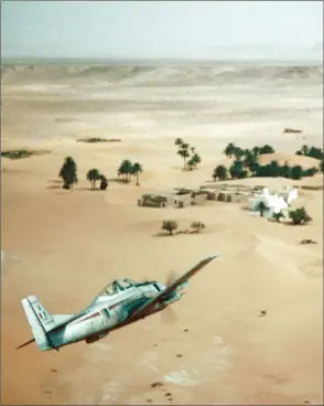  ?? JEAN-CLAUDE LARTIGAU ?? T-28 de l’EALA 3/5 en reconnaiss­ance à vue sur les grandes étendues arides du sud oranais.