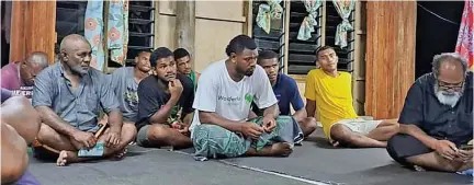  ?? Photo: Unity Fiji ?? Atunaisa Mocenalutu (right), with attendees of the Unity Fiji campaign at Nadonumai, Lami on November 29, 2022.