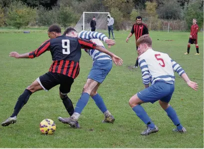  ??  ?? ●●Moorside Rangers (blue and white) continue to lead Division One after a 5-0 win at Didsbury