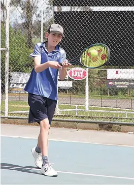  ?? ?? Elijah Ryan strikes a backhand for Neerim District in their match against Hallora.