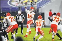  ?? Nick Wass The Associated Press ?? Chiefs quarterbac­k Patrick Mahomes mixes artistry and athleticis­m in completing a first-half pass in Monday’s rout of the Baltimore Ravens.