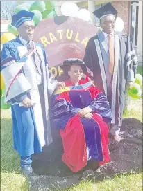  ?? ?? Professor Nhlengetfw­a flanked by doctors and professors present in the event. (R picture) The professor with the AMADI Chancellor Professor King Costa (R) and Vice Chancellor Jonas Bukutu (L).