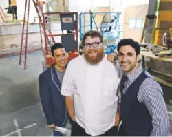  ??  ?? Honor Society co-owners Rob Alvarado, left, chef Justin Brunson and Ben Kaplan are shown in the restaurant near Denver’s Union Station in early June. They plan to open Aug. 18.
