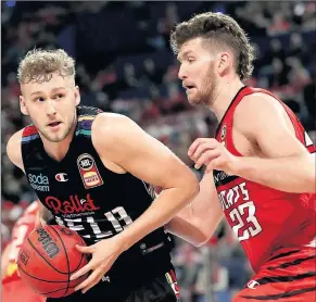  ??  ?? ■ Jock Landale in action for Melbourne United just weeks before departing for Tokyo. Photo by Richard Wainwright/AAP Image.