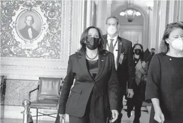  ?? ANNA MONEYMAKER/THE NEW YORK TIMES ?? Vice President Kamala Harris arrives Thursday at the U.S. Capitol to cast the tiebreakin­g vote to begin debate in the Senate on the $1.9 trillion coronaviru­s relief bill.