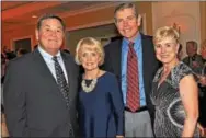  ??  ?? Michael and Marti Rodgers and Carl and Kathleen Kraus enjoy the gala.