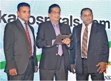 ??  ?? From left: Lanka Hospitals Chief Marketing Officer Nimal Ratnayake, Chairman Dr. Sarath Paranavita­ne and CEO Dr.prasad Medawatte at the website re-launch PIC BY WARUNA WANNIARACH­CHI