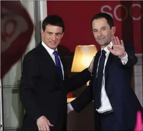  ??  ?? Au soir du second tour, Valls et Hamon en appellaien­t à l’union.
