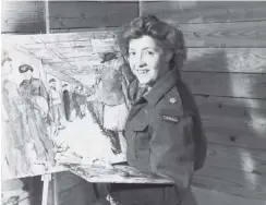  ??  ?? Left: Lieutenant Bruno Bobak, photograph­ed sitting on a field chair as he completes a painting in Germany in March 1945. Right: Molly Lamb in London, England, in 1945.