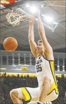  ?? Cliff Jette The Associated Press ?? Iowa senior Luka Garza on passing on the NBA draft: “I feel like the teams that like me this year will like me next year.”