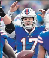  ?? ASSOCIATED PRESS FILE PHOTOS ?? Raiders coach Jon Gruden has his hands full. Right: Bills QB Josh Allen has some new additions to work with.