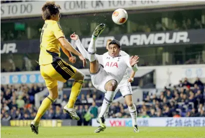  ?? —AFP ?? Paulinho attempts a bicycle kick during a Europa League match against Sheriff Tiraspol at White Hart Lane in London.