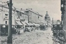  ?? PUBLISHED BY RUMSEY & COMPANY, TORONTO RYCH MILLS COLLECTION ?? Just behind the 1929 camera position was Galt’s old Main Street bridge. The Grand River was flowing over its deck and these cars are fleeing east to escape the rampage.