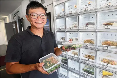  ??  ?? Fastbee.sg founder Khoo. Its vending machines are located at four office hubs. — Photos: The Straits Times