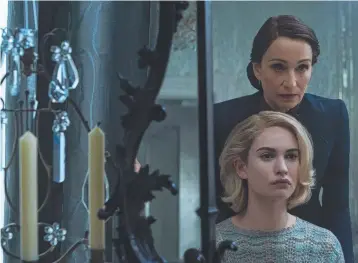  ??  ?? Lily James as Mrs de Winter and Kristin Scott Thomas as Mrs Danvers.