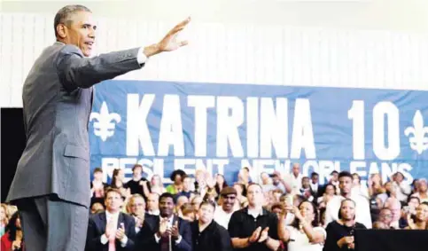 ?? — AP ?? NEW ORLEANS: President Barack Obama waves after speaking at an event commemorat­ing the 10th anniversar­y of Hurricane Katrina.