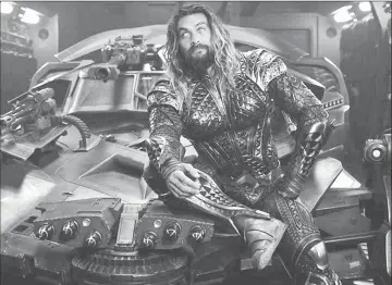  ??  ?? Jason Momoa’s Arthur Curry, shown here in ‘Justice League’, will return for a solo spin in next year’s ‘Aquaman’. — Courtesy of Warner