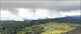  ?? U.S. GEOLOGICAL SURVEY ?? Sulfur dioxide plumes rise from fissures along the rift of Hawaii’s Kilauea volcano. Thursday’s eruption did not pose an immediate threat to people in the vicinity, officials said.