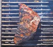  ?? ANDREW PURCELL NYT ?? Reverse-searing allows thick cuts of steak to cook to an even doneness and develop a charred crust.