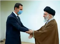  ?? ?? Iranian Supreme Leader Ayatollah ALI KHAMENEI AND Syrian PRESIDENT BASHAR ASSAD SHAKE HANDS At THE start of THEIR MEETING In TEHRAN on Sunday. — ap