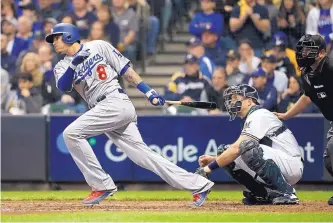  ?? JEFF ROBERSON/ASSOCIATED PRESS ?? Manny Machado was booed by Brewers fans after hard slides and kicking the leg of the first baseman in the NLCS. He also had an incident in 2017 with the Red Sox, the Dodgers’ World Series opponent.