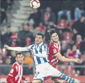  ?? Foto: PERE PUNTÍ ?? Juanmi, entonces en la Real, y Juanpe, durante un Girona-real Sociedad