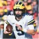  ?? BEN JACKSON/GETTY ?? Quarterbac­k J.J. McCarthy led Michigan over rival Ohio State on Saturday, securing the Wolverines’ trip to the Big Ten title game.