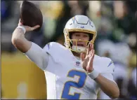  ?? (AP/Matt Ludtke) ?? Quarterbac­k Easton Stick will make his first NFL start today as the Los Angeles Chargers face the Las Vegas Raiders. Stick took over for Justin Herbert, who broke his index finger on his right hand in a loss last week to Denver.