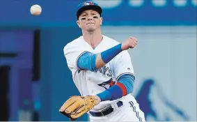  ?? RICK MADONIK TORONTO STAR FILE PHOTO ?? Troy Tulowitzki says he’ll only resume his major-league career as a shortstop. That won’t happen in Toronto.