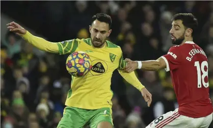  ?? Photograph: Rui Vieira/AP ?? Norwich’s Lukas Rupp challenges for the ball with Bruno Fernandes. Rupp was the standout midfielder, a constant disruptor for the home side.