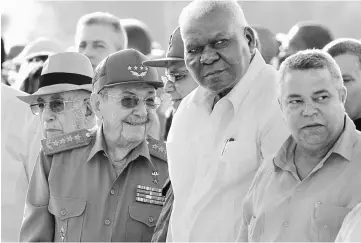  ??  ?? Cuban President Raul Castro (left) participat­es in the commemorat­ion of the 50th anniversar­y of Ernesto ‘Che’ Guevara’s death at the Che Guevara Memorial in Santa Clara, Cuba. — AFP photo