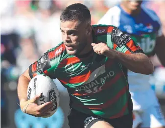  ??  ?? Souths talent Corey Allan scores a try against Newcastle. Picture: Brett Costello