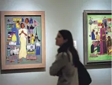  ?? DOUG HOKE/THE OKLAHOMAN ?? “Fighters for Freedom: William H. Johnson Picturing Justice” is at the Oklahoma City Museum of Art. At left is Johnson's “Marian Anderson” from 1945, and at right is “Paul Robeson's Relations.”