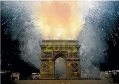  ??  ?? The Arc de Triomphe during the New Year’s Celebratio­n on the Champs-Elysees.