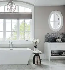  ??  ?? The ensuite stands outs with its quartzite counters and free-standing tub.