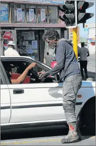  ?? Picture: RANDELL ROSKRUGE ?? DESPERATE: A homeless man begs for food and money in Oxford Street, where he has been stationed for years